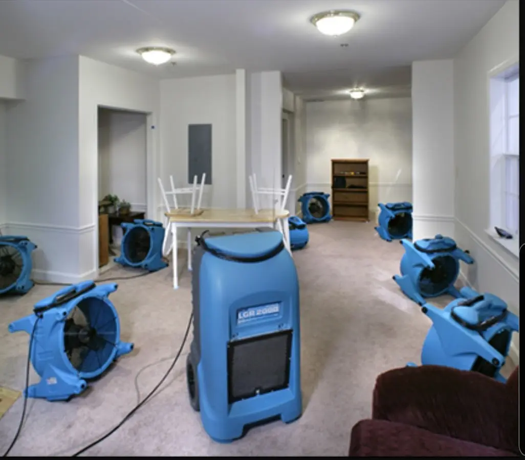 Air movers and dehumidifier setup for Water Damage Restoration in Winter Beach